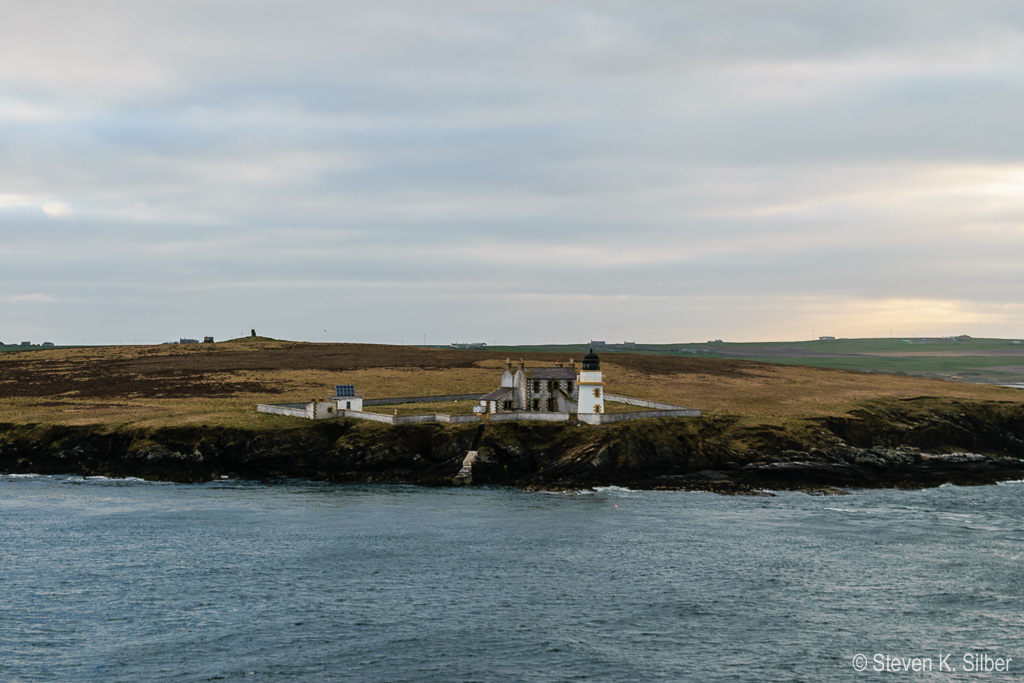 Lighthouse on the approach to Kirkwall. (1/100 sec at f / 6.3,  ISO 100,  55 mm, 18.0-55.0 mm f/3.5-5.6 ) May 08, 2017